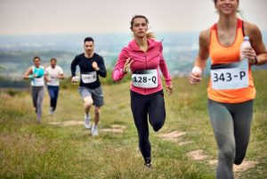group-athletic-people-running-marathon-nature-focus-is-young-woman-1761114760-821x550