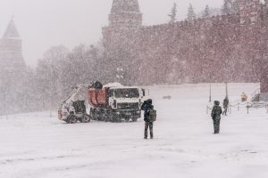 Moscow, Russia. 25th December, 2014. Weather: Heavy snowstorm in Moscow today. Cold and windy day, low temperature up to -8C (-22F) and heavy snow. The first snowstorm in the season after a month of gloom and dirt. Winter finally came to power on the eve