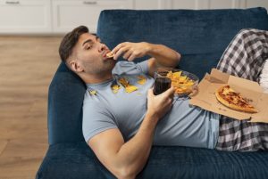 person-with-eating-disorder-trying-eat-fast-food-1768980049-821x550
